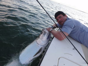 Happy client with his trophy Tarpon